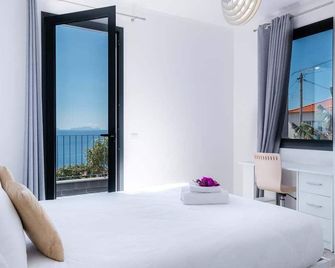 Guestready - Leme Beach Breathtaking Views - Gaula - Habitación