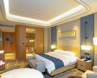 Conch International Hotel - Wuhu - Bedroom