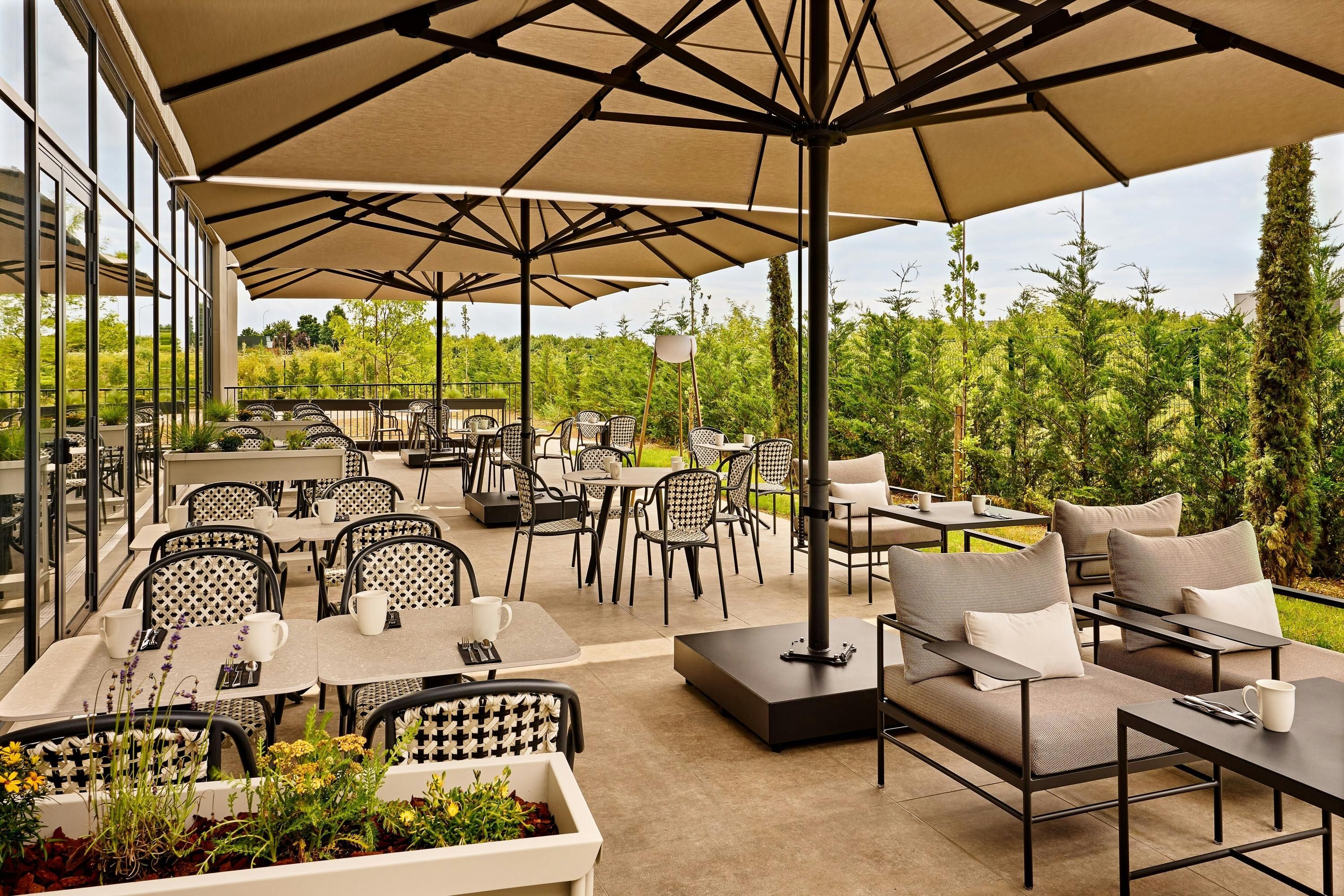 Courtyard by Marriott Lyon Eurexpo Stadium - Genas - Innenhof