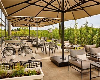 Courtyard by Marriott Lyon Eurexpo Stadium - Genas - Binnenhof
