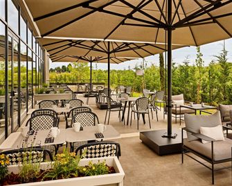 Courtyard by Marriott Lyon Eurexpo Stadium - Genas - Innenhof