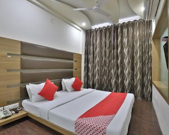 OYO 41737 Hotel Atithi - Porbandar - Bedroom