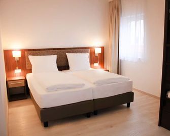 Anor Hotel I Park Sleep & Fly I Frankfurt Airport - Mörfelden-Walldorf - Schlafzimmer