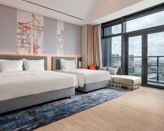 Holiday Inn Express Haikou Int'L Duty Free City By IHG - Haikou - Bedroom