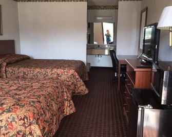Executive Inn - West Columbia - Schlafzimmer