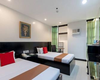 Check Inn Hotel Dumaguete City - Dumaguete City - Bedroom