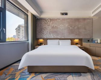 Dongshan Holiday Hotel (Jishui County Government Branch) - Ji'an - Slaapkamer