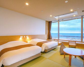 Ooedo Onsen Monogatari Premium Shiomiso - Murakami - Slaapkamer