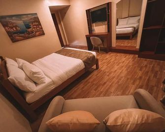 Rufana Suites - Moalboal - Bedroom