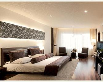 بيلفدير هوتل برازوف - براسوف - غرفة نوم