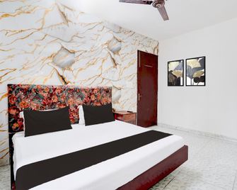 Spot on Lotus Hotel - Pānīpat - Bedroom