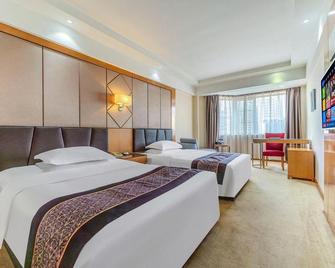 Nanlin International Hotel - زيان - غرفة نوم