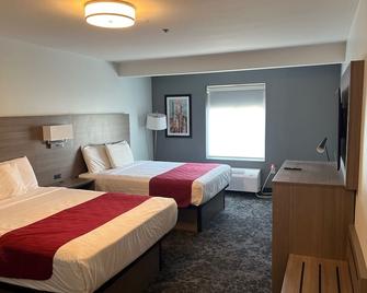 Manchester Inn & Suites - Manchester - Спальня