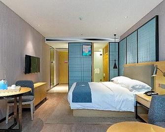 Echarm Hotel Nanning Nationalities Square Metro Station - Nanning - Bedroom