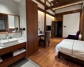 One read and one clean homestay - Huangshan - Bedroom