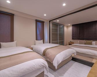 ريزيدنس هوتل تاكاياما ستيشن - تاكاياما - غرفة نوم