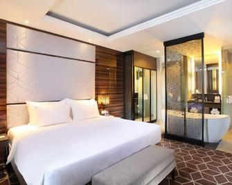 Swiss-Belinn Tunjungan Surabaya - סוראבאיה - חדר שינה