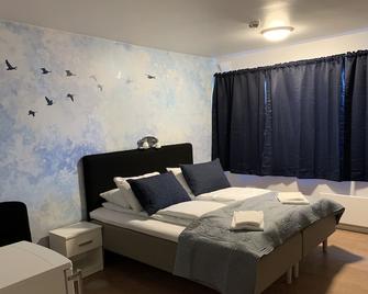 Husnes Sentrum Hotell - Valen - Camera da letto