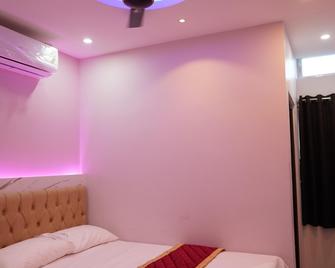 Pavan Vela Grand - Dindukkal - Schlafzimmer