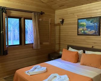 Canada Hotel & Bungalows - צ'יראלי - חדר שינה