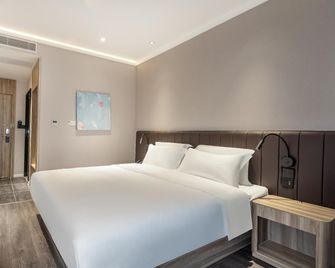 Hanting Hotel Changzhou Zhongtian Stadium - Changzhou - Kamar Tidur