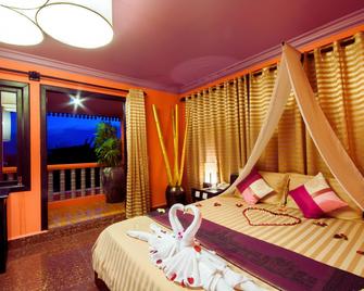 Golden Butterfly Villa - סיאם ריפ - חדר שינה