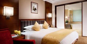 Yidu Jinling Grand Hotel Yancheng - Yancheng - Slaapkamer