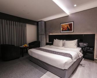 Khuttar Apartment - Amman - Bedroom
