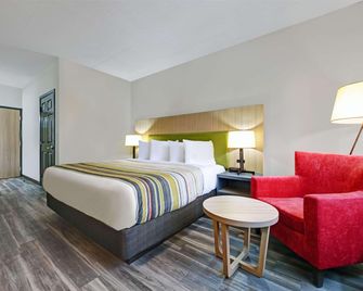 Country Inn & Suites by Radisson, Pierre, SD - Pierre - Bedroom