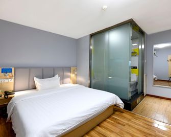 7 Days Inn Bazhong Jiang Bei Bus Station Branch - Bazhong - Bedroom