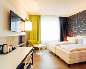 harry's home hotel & apartments - Hart bei Graz - Schlafzimmer
