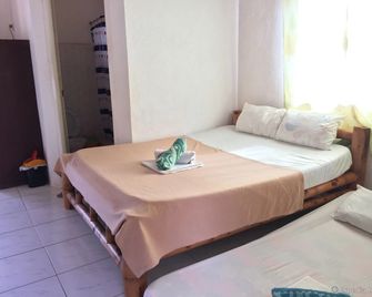 Acacia Sunset Village Inn - פנגלאו