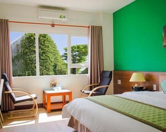 Sai Gon Phong Nha Hotel - Son Trach - Bedroom