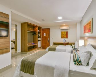 بلازا إن بريز أيروبورتو - غويانيا - غرفة نوم