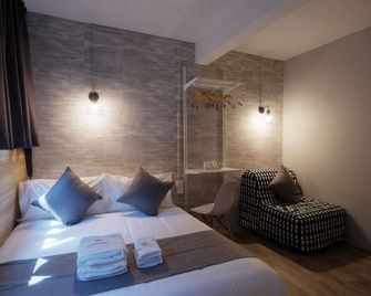 كو لوفت هوتل أن ٔ وك - سنغافورة - غرفة نوم