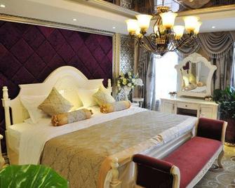 Shijiazhuang Jingzhou International Hotel - Shijiazhuang - Bedroom