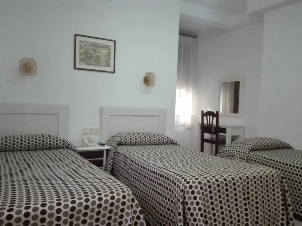 Hotel Royal - רונדה - חדר שינה