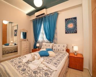 Blue Boutique Apts - Gázi - Schlafzimmer