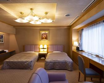 Hotel Symphony Sagae Onsen - Sagae - Makuuhuone
