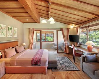 Puri Sabina Bed & Breakfast - South Kuta - חדר שינה