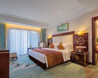 Wudangshan Jianguo Hotel - Shiyan - Camera da letto