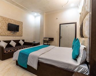 Juststay Gulmohar Inn - Gwalior - Bedroom
