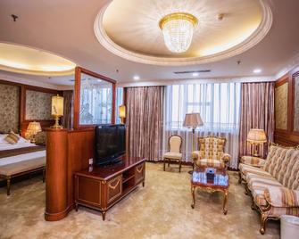Huarong Hotel (University of Technology Railway Station Store) - Harbin - Bedroom