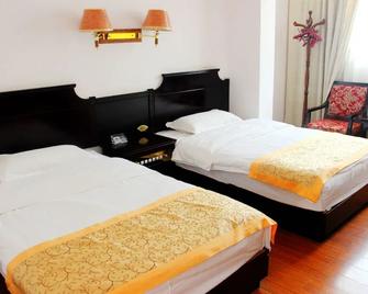 Wei Shan Hotel - Dali - Chambre