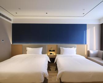 Elong Anyue Hotel Nanjing Banqiao Wuyue Plaza - Nanjing - Bedroom