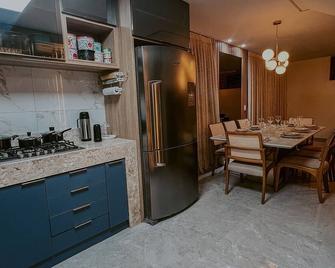 Aconchego do João - Cruz - Comedor