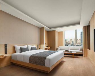 Yozawa Hotel Service Apartment (Xiaobailou Wudadao) - Tianjín - Habitación