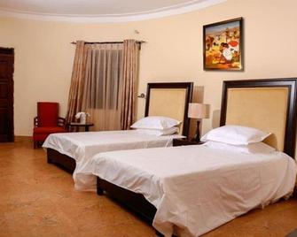 Nature's Green Beach Resort - קמפאלה - חדר שינה