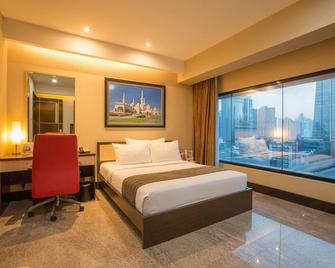 Manhattan Hotel Jakarta - Jakarta - Schlafzimmer