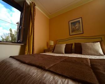 Residenze L'Uncinaia Holiday House - Perugia - Schlafzimmer